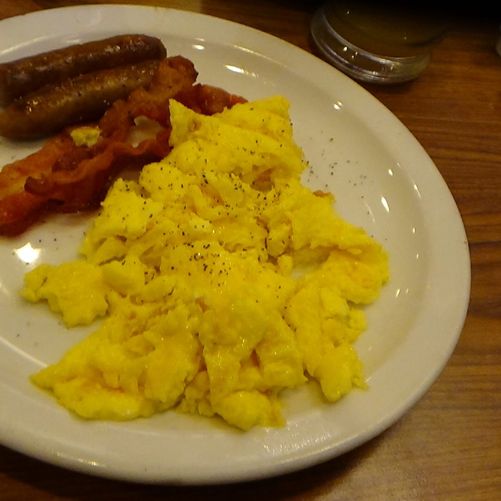 Denny's - Bacon sausage and scrambled eggs great combo with French Toast . - Breakfast & Brunch Near Me - National City, California Denny's - Bacon sausage and scrambled eggs great combo with French Toast . - Breakfast & Brunch Near Me - National City, California