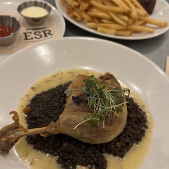 Red Cow - Duck confit has amazing aroma and texture! Too bad it was too salty. - French Near Me - Seattle, Washington