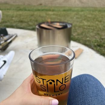 Stone Silo Brewing - a person holding a glass of beer - Brewpubs Near Me - Damascus, Maryland