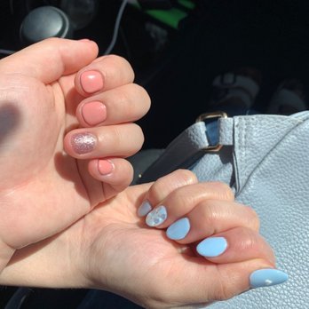 Springfield Nail - Left: gel polish with one design, cost $40 Right: gel polish with 2 design, cost $50 25% tip - Nail Salons Near Me - Oakland Gardens, New York Springfield Nail - Left: gel polish with one design, cost $40 Right: gel polish with 2 design, cost $50 25% tip - Nail Salons Near Me - Oakland Gardens, New York