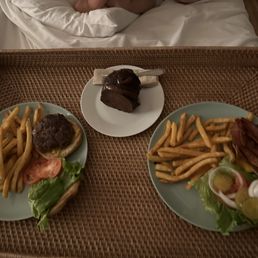 Hamburgers, fries & chocolate cake slice