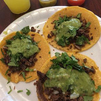 Ponchos Tacos - Tres carne asada tacos with green + red sauce with the pineapple bev - Mexican Near Me - Fullerton, California Ponchos Tacos - Tres carne asada tacos with green + red sauce with the pineapple bev - Mexican Near Me - Fullerton, California