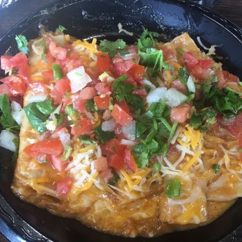 Taco Cabana - Five enchiladas after covered with pico de gallo, cilantro, & salsa. - Mexican Near Me - Houston, Texas