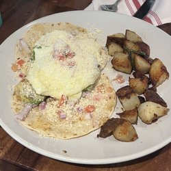Octopus - Huevos rancheros with egg over easy