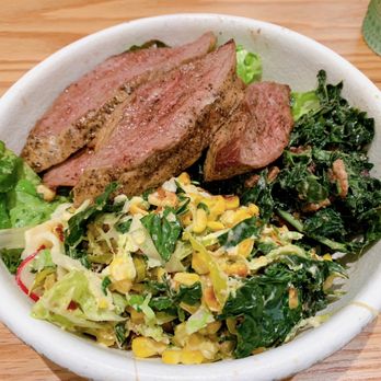 Naked Farmer - Chimichurri steak salad: seasonal bowl that comes with kale salad, street corn and Bok Choy. - New American Near Me - Sunrise, Florida Naked Farmer - Chimichurri steak salad: seasonal bowl that comes with kale salad, street corn and Bok Choy. - New American Near Me - Sunrise, Florida