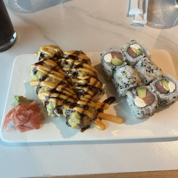 Harmony Steakhouse - Crab Rangoon Roll (left) & Philadelphia Roll (right) - Steakhouses Near Me - Indianapolis, Indiana Harmony Steakhouse - Crab Rangoon Roll (left) & Philadelphia Roll (right) - Steakhouses Near Me - Indianapolis, Indiana