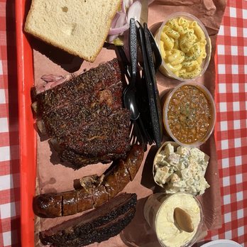Terry Black's Barbecue - Sausage Brisket Pork Ribs Mac and Cheese Potato Salad Baked Beans Banana Pudding - Barbeque Near Me - Austin, Texas Terry Black's Barbecue - Sausage Brisket Pork Ribs Mac and Cheese Potato Salad Baked Beans Banana Pudding - Barbeque Near Me - Austin, Texas
