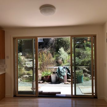 Sebastian Francese General Contractor - Sliding doors open from the dining room onto the back garden. - General Contractors Near Me - Richmond, California Sebastian Francese General Contractor - Sliding doors open from the dining room onto the back garden. - General Contractors Near Me - Richmond, California