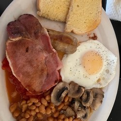 Champions Pub - This is a small breakfast. Wow it was more than enough. The full breakfast doubles the meat and egg