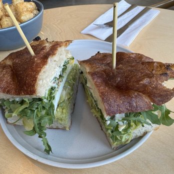 Emmett’s Cafe - TK Sandwich with avocado, egg, white cheddar, arugula, pickled zukes, creamy whole grain mustard on matija focaccia - Cafes Near Me - Columbus, Ohio