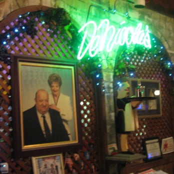DeNicola's Restaurant - Upon departing and paying, a cool photo of the patriarch and matriarch greet you. I'm thinking they shared wearing the pants. - Italian Near Me - Portland, Oregon DeNicola's Restaurant - Upon departing and paying, a cool photo of the patriarch and matriarch greet you. I'm thinking they shared wearing the pants. - Italian Near Me - Portland, Oregon