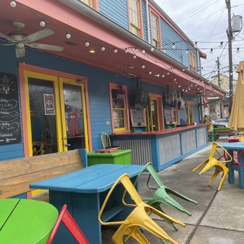 Dat Dog - Patio after an afternoon shower - Hot Dogs Near Me - New Orleans, Louisiana Dat Dog - Patio after an afternoon shower - Hot Dogs Near Me - New Orleans, Louisiana