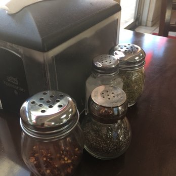La Slice Pizzeria - Condiments at the table - Pizza Near Me - Islandia, New York La Slice Pizzeria - Condiments at the table - Pizza Near Me - Islandia, New York