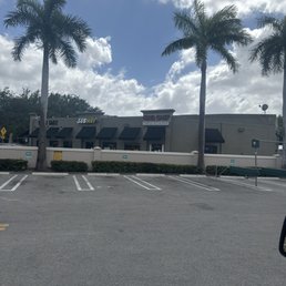 Empty parking lot that are fighting over 5 spaces no one uses anyways .