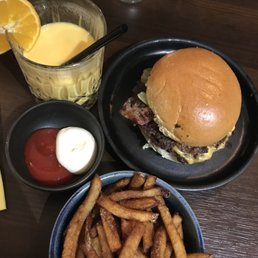 Umami burger with fries and a mango lassi! Umami burger with fries and a mango lassi!