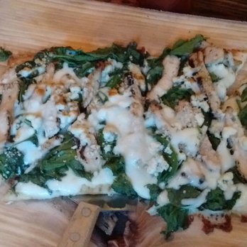 The North Star Tavern - Spinach, chicken, and blue cheese half sized flatbread. Looks small, but more than enough for one. - American Near Me - Elma, New York The North Star Tavern - Spinach, chicken, and blue cheese half sized flatbread. Looks small, but more than enough for one. - American Near Me - Elma, New York