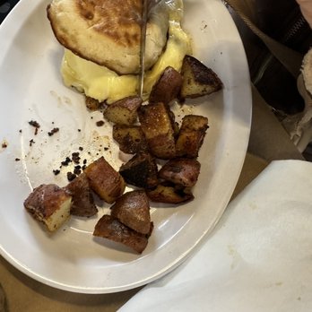 The Sinful Kitchen - Breakfast sandwich, egg over medium w lamb bacon & American cheese and home fries - Breakfast & Brunch Near Me - Portland, Maine The Sinful Kitchen - Breakfast sandwich, egg over medium w lamb bacon & American cheese and home fries - Breakfast & Brunch Near Me - Portland, Maine