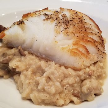 The Capital Grille - Chilean sea bass with mushroom risotto - Steakhouses Near Me - Baltimore, Maryland The Capital Grille - Chilean sea bass with mushroom risotto - Steakhouses Near Me - Baltimore, Maryland