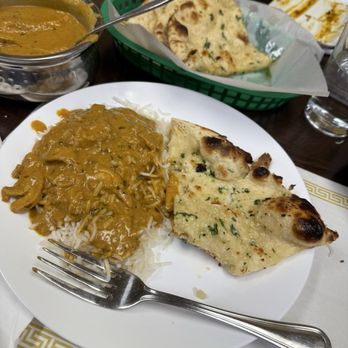 Biryani & Chaat - Authentic South Indian & north Indian food - Butter Chicken, Garlic Naan, and a side of rice - Indian Near Me - Rocklin, California