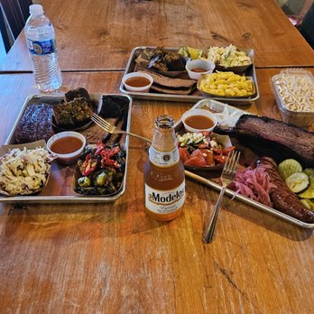 Stiles Switch BBQ & Brew - beef rib, pork belly, pork ribs, brisket, House smoked sausage, slaw. - Barbeque Near Me - Austin, Texas