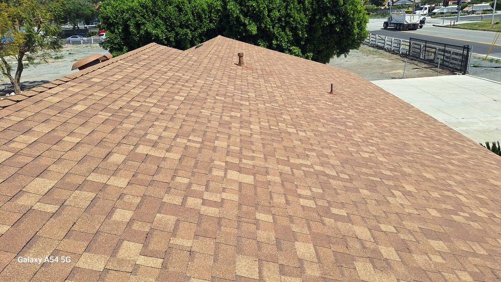 Slide of Sandoval Roofing