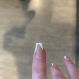 They are all crooked, she left white nail polish all over my fingers, and she kept drilling through the cut she made with the drill They are all crooked, she left white nail polish all over my fingers, and she kept drilling through the cut she made with the drill