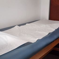 Concentra Medical Center - Paper was not changed out on the exam table. You can clearly see someone was laying on it before me.