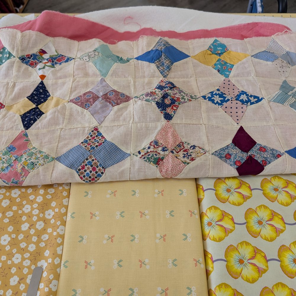 Cary Quilting Company - Vintage baby quilt and suggested backings - Fabric Stores Near Me - Cary, North Carolina