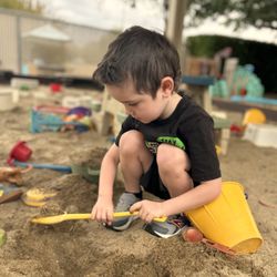 Sunshine House Preschool - Hands-on sensory exploration! Sandbox play develops fine motor strength, spatial awareness, and creative focus.