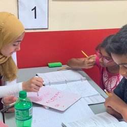 Best Score - Our tutors helping students with their homework.