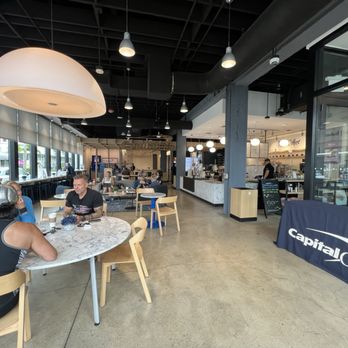 Capital One Café - people sitting at tables in a restaurant - Banks & Credit Unions Near Me - Delray Beach, Florida Capital One Café - people sitting at tables in a restaurant - Banks & Credit Unions Near Me - Delray Beach, Florida