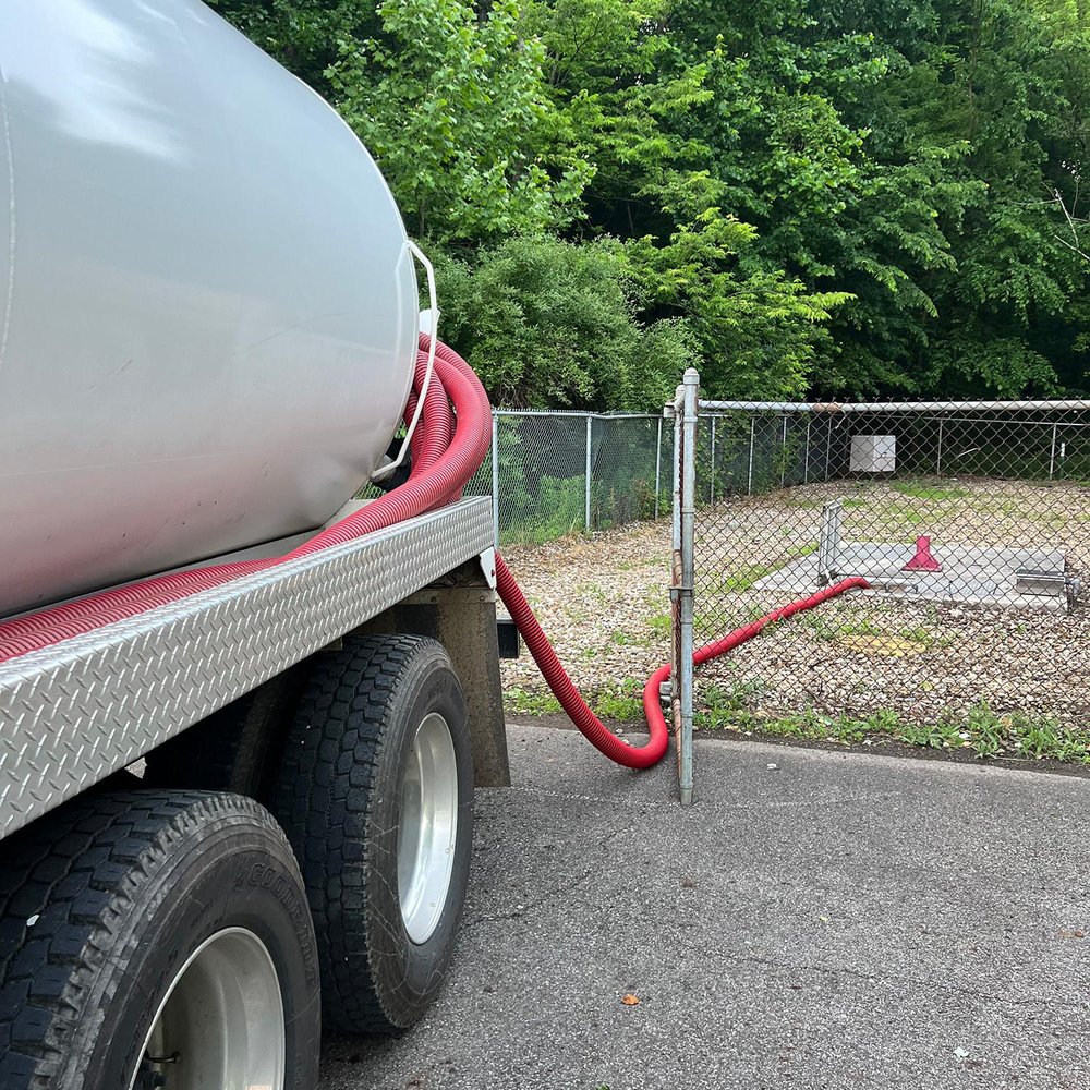 Slide of Brown Drain Service