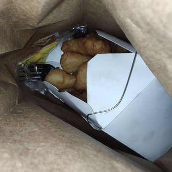 Happy Garden - Still-stapled bag with a gaping hole on one side and chicken covered in greasy dough spilling out. - Chinese Near Me - Williston Park, New York Happy Garden - Still-stapled bag with a gaping hole on one side and chicken covered in greasy dough spilling out. - Chinese Near Me - Williston Park, New York