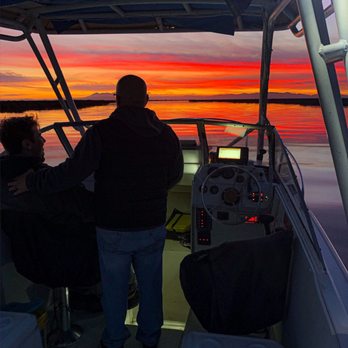 Wombat Charters - That is literally the color of the sun set that sailed into - Fishing Near Me