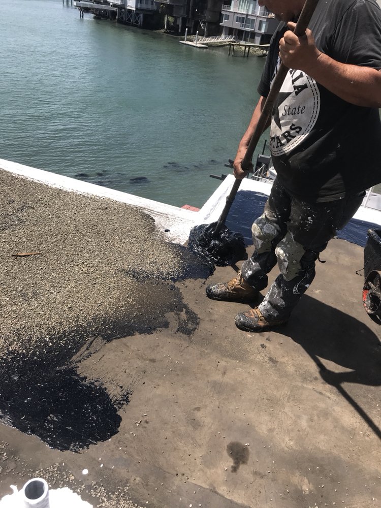 Slide of Francos Roofing