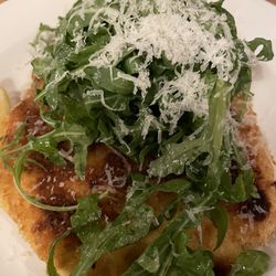 Chicken Milanese with arugula and Parmesan