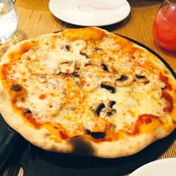 ASK Italian - Pizza to share, classic margarita with mushrooms and prawns.