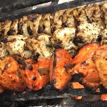 Mirchi Restaurant - a variety of grilled meats on a grill - Indian Near Me - Calgary, Alberta Mirchi Restaurant - a variety of grilled meats on a grill - Indian Near Me - Calgary, Alberta
