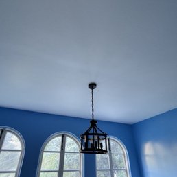 AFTER: Ceiling looks better than ever after painting. And they installed a new lamp. AFTER: Ceiling looks better than ever after painting. And they installed a new lamp.