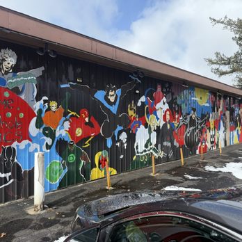 Rabbit Hole Comics - Store mural - Comic Books Near Me - Hartford, Michigan