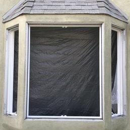 Before, with single-pane windows removed.