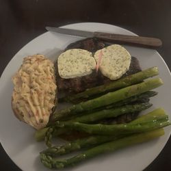 Sway’s Bar And Event Center - Ribeye with herb butter, twice baked potato, and asparagus