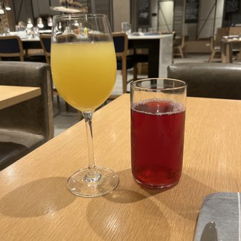 Stoke - Mimosa and cranberry juice - New American Near Me - Charlotte, North Carolina Stoke - Mimosa and cranberry juice - New American Near Me - Charlotte, North Carolina
