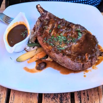 Sapphire - Bone in 45 day aged Ribeye with black peppercorn sauce - New American Near Me - Laguna Beach, California Sapphire - Bone in 45 day aged Ribeye with black peppercorn sauce - New American Near Me - Laguna Beach, California