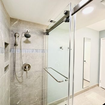 Tile Center - Walk in shower with grey tile and glass accent tile. - Kitchen & Bath Near Me - Gaithersburg, Maryland Tile Center - Walk in shower with grey tile and glass accent tile. - Kitchen & Bath Near Me - Gaithersburg, Maryland