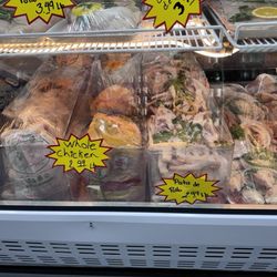 El Guero Mini Market - Whole chicken and deli meats.