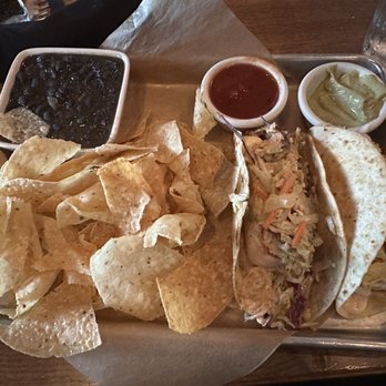 BJ's Restaurant & Brewhouse - Mahi-Mahi Or Shrimp Tacos (the photo is oven roasted mahi mahi) - New American Near Me - Gainesville, Florida BJ's Restaurant & Brewhouse - Mahi-Mahi Or Shrimp Tacos (the photo is oven roasted mahi mahi) - New American Near Me - Gainesville, Florida