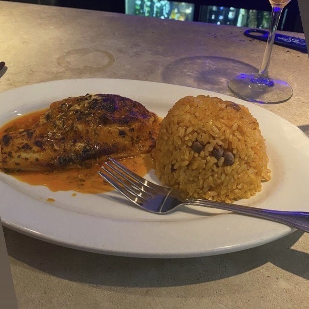Coquito - Stuffed sole & rice with penguin peas - Latin American Near Me - Warwick, New York Coquito - Stuffed sole & rice with penguin peas - Latin American Near Me - Warwick, New York