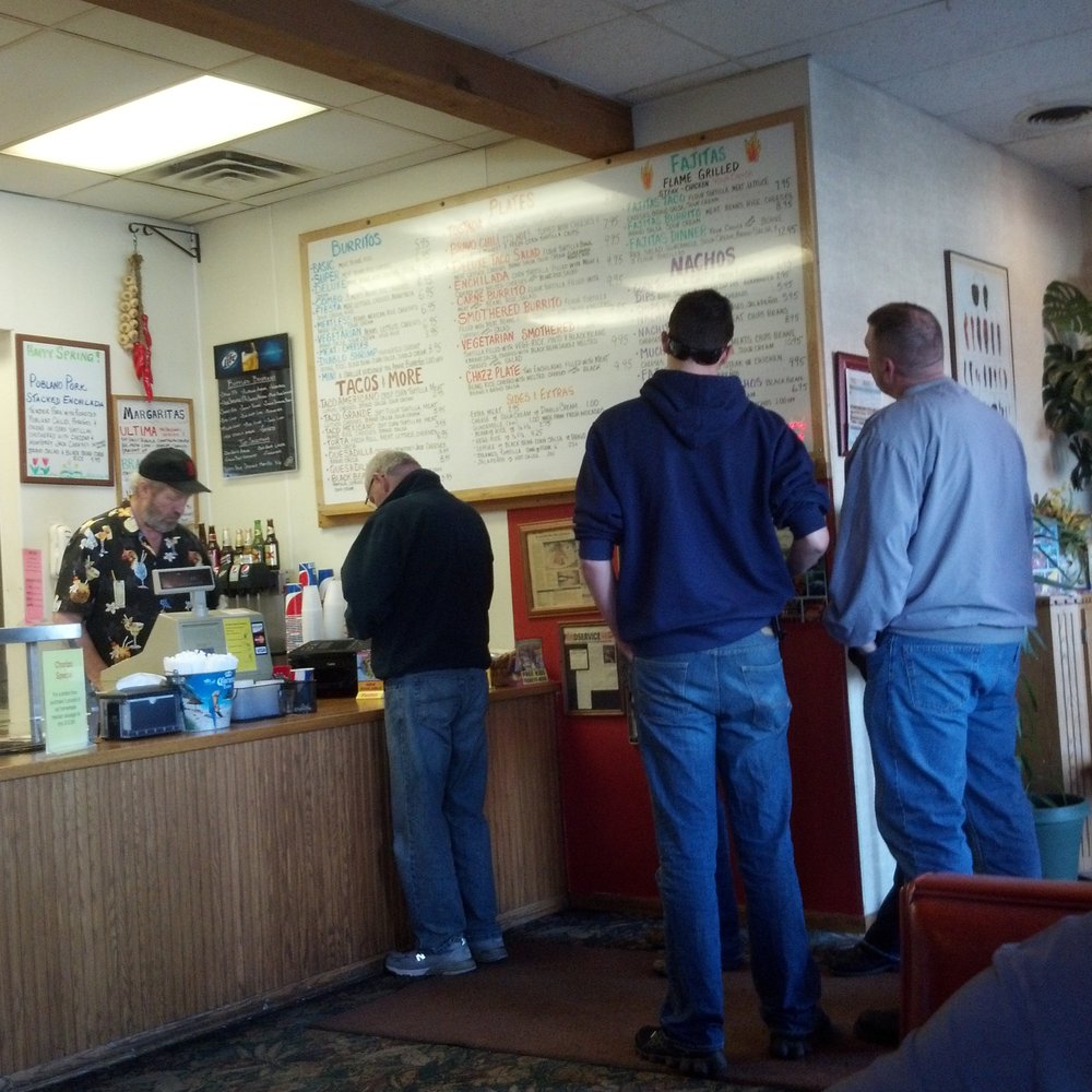 Bravo Burrito - a group of people standing at a counter - Mexican Near Me - Saint Cloud, Minnesota Bravo Burrito - a group of people standing at a counter - Mexican Near Me - Saint Cloud, Minnesota