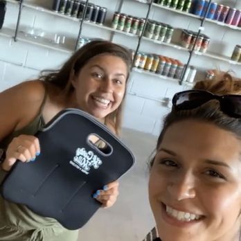 McCarty Mills Taproom - Small part of their beer selection and neoprene can carriers! - Beer Bar Near Me - Aurora, Illinois